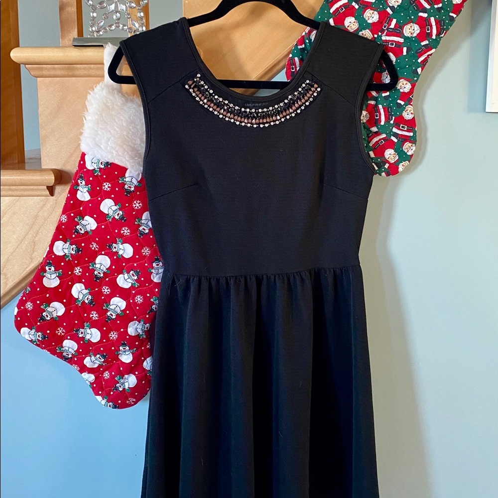 Black dress with detailed neckline